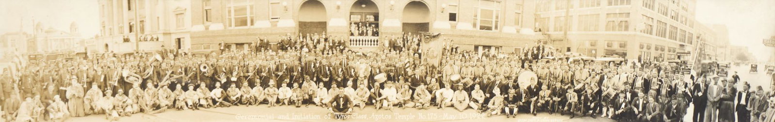 Dramatic Order of the Knights of Khorassan, 1922: Panoramic photographic print depicting the ceremony and initiation of Tyros Class, Azotos Temple No. 157 (Fort Worth, Texas), United Photo @ Press Service (513 1/2 Main Street), dated 1922, photograph