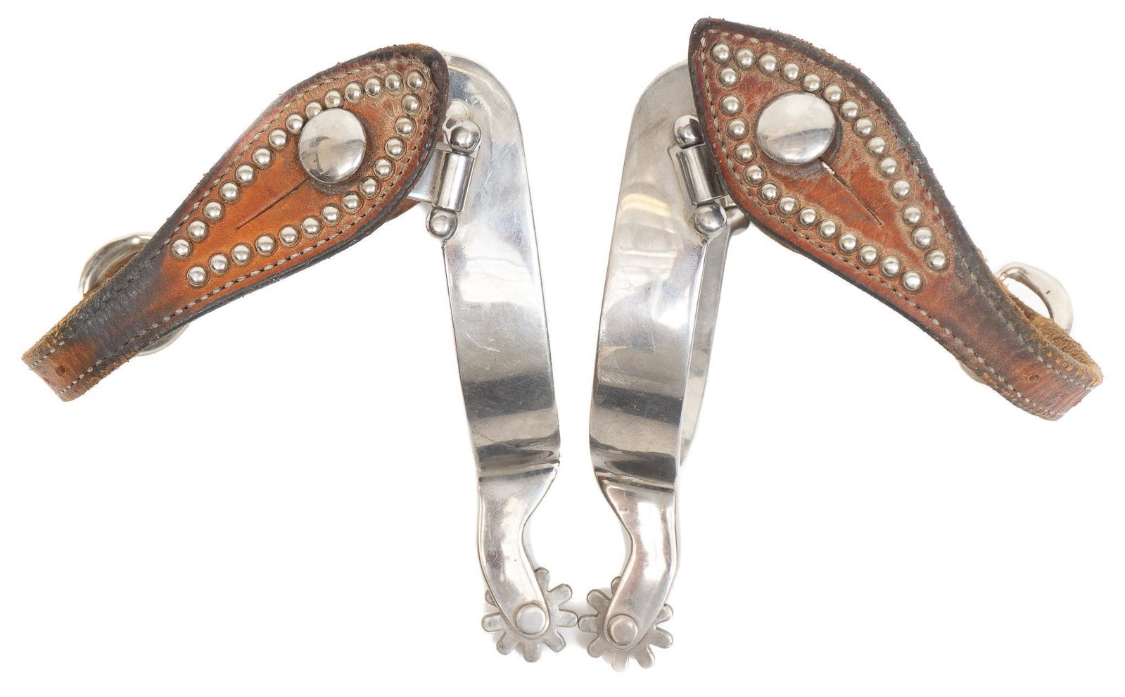 Toklat Mylers Contemporary Spurs: Toklat Mylers maker marked contemporary spurs with spotted straps 5"w x 9"d/ each Provenance: An Alamo Heights, Texas collection We happily provide seamless shipping services on everything we sell. Pl