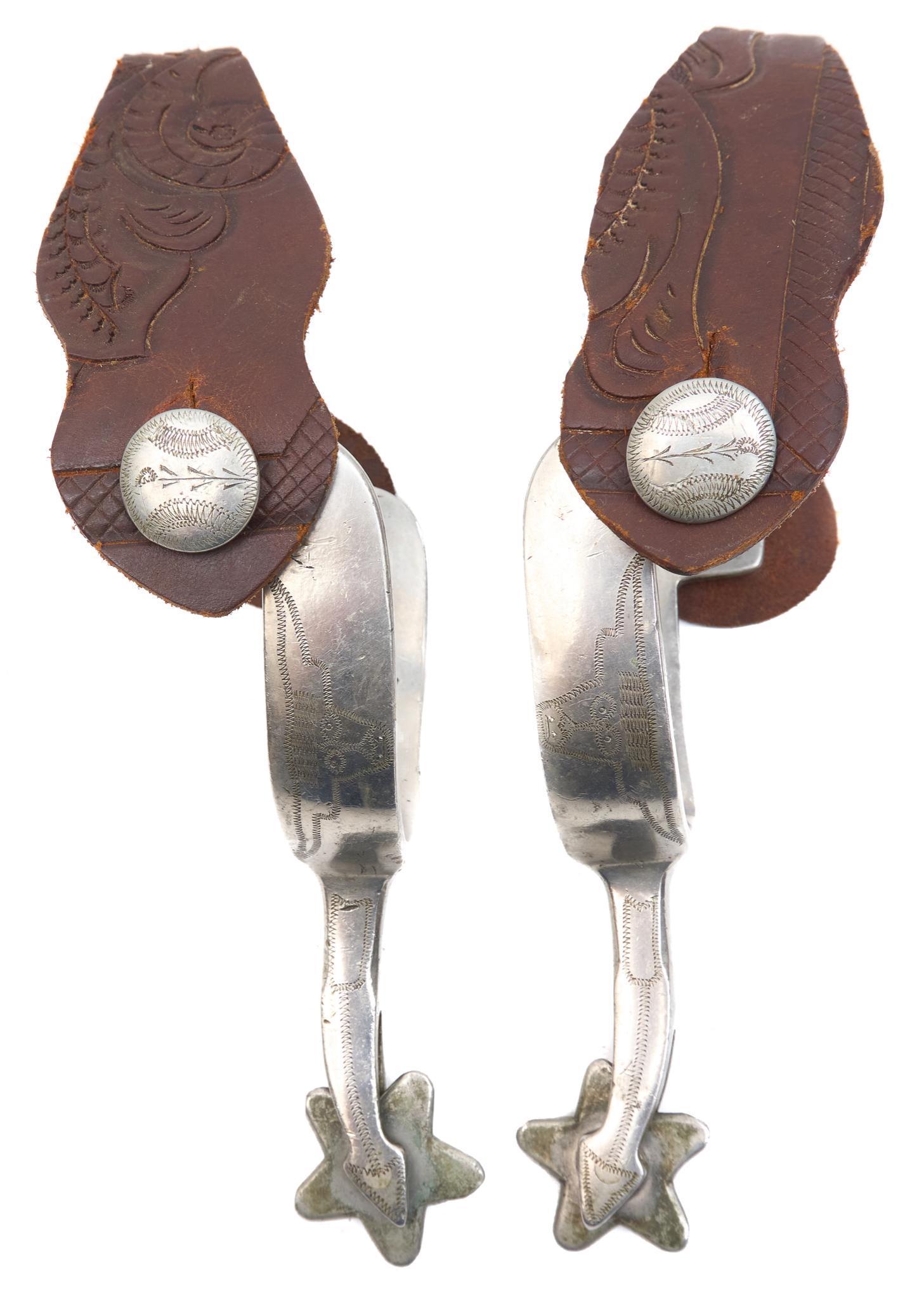 Texas Star Longhorn Arrowshank Spurs: Texas star marked longhorn pattern arrowshank spurs 10"w x 4"d/ each Provenance: An Alamo Heights, Texas collection We happily provide seamless shipping services on everything we sell. Please email us