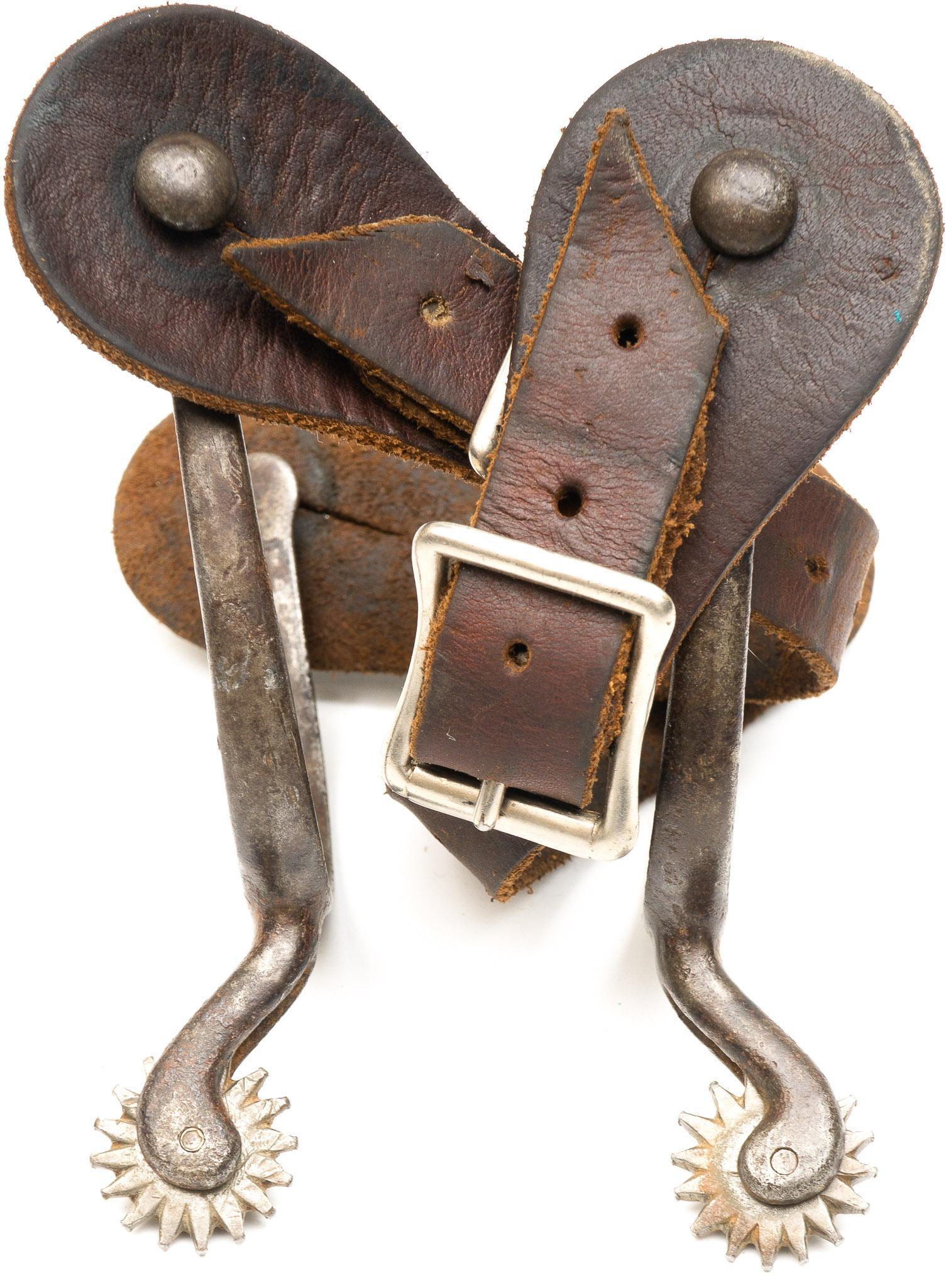 Early Iron Military Style Spurs: Early iron military style spurs 3"h x 5"w/ each Provenance: An Alamo Heights Collection We happily provide seamless shipping services on everything we sell. Please email us at shipping@vogtauction.com
