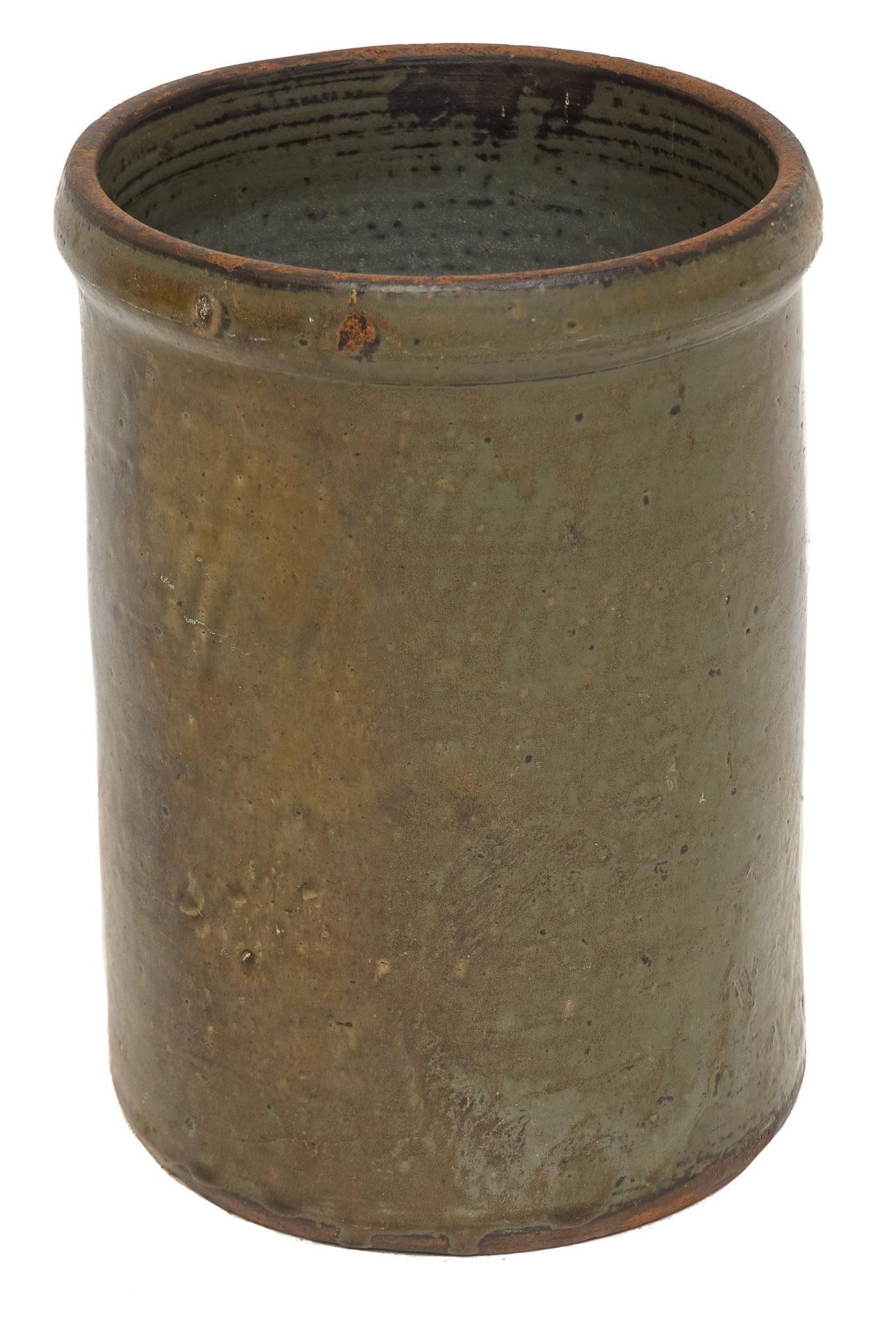 Texas Glazed Pottery Crock, Believed to be Meyer: Early 20th century olive glazed pottery crock believed to be Meyer, from Medina County, Texas Provenance: A San Antonio, Texas collection We happily provide seamless shipping services on everything we