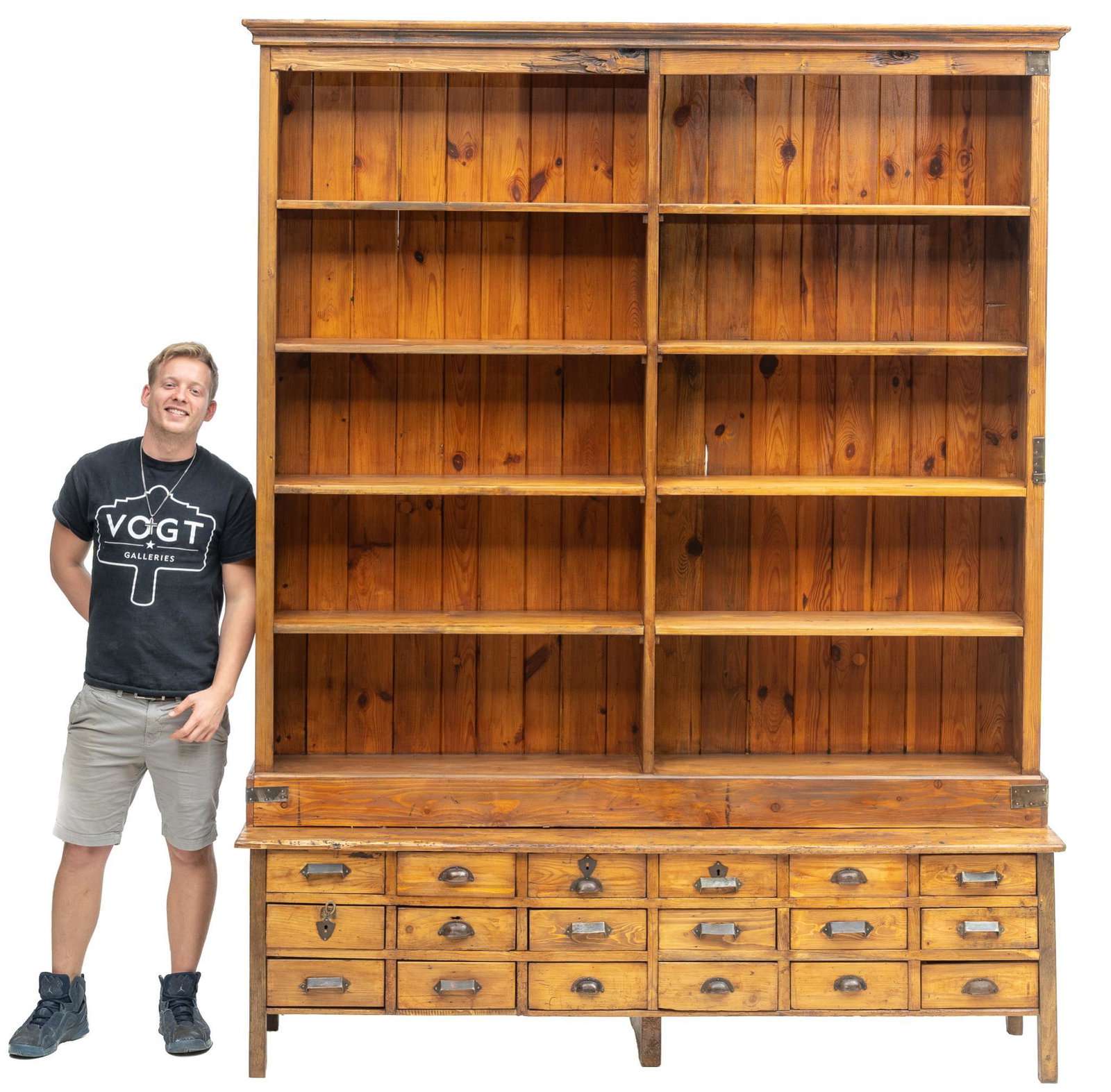 Rustic General Store Display Cabinet: Rustic general store shop display cabinet, featuring ten open shelves over eighteen drawers, with metal hardware 99"h x 77.5"w x 19"d We happily provide seamless shipping services on everything we sel