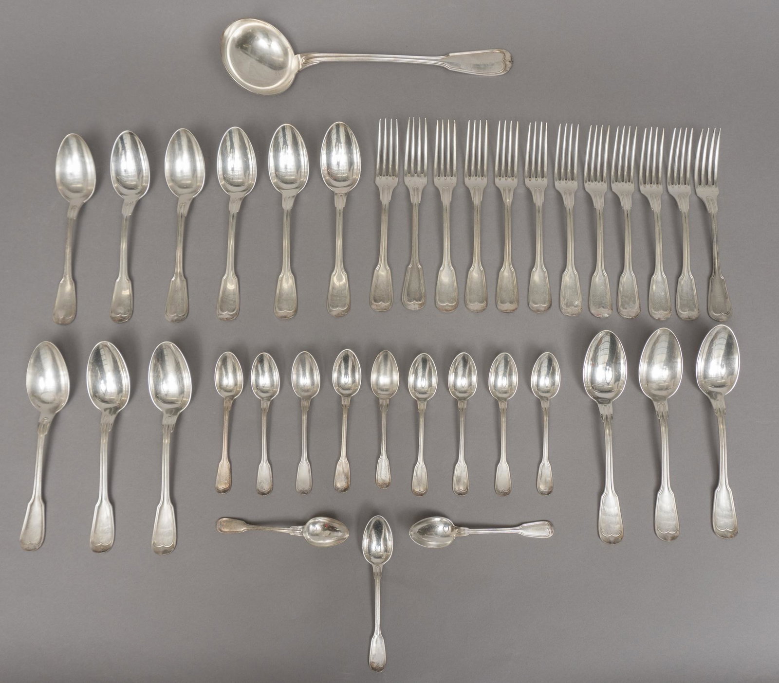 Collection of Silverplate Flatware: Collection of silverplate flatware, to include ladle, forks, soup spoons, and teaspoons, some stamped 2.5"h x 13"w x 13.5"d/ largest Provenance: A San Antonio, Texas collection We happily provide seam