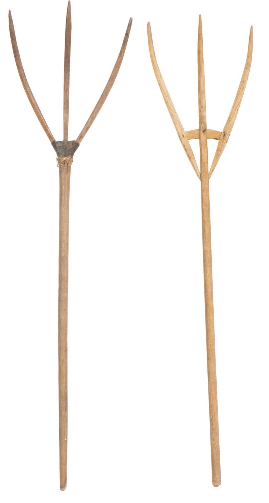 Pair of Primitive Hay Rakes: Pair of primitive wooden farm hay rakes 65"h x 17"w/ largest Provenance: A Hill Country Village, Texas collection We happily provide seamless shipping services on everything we sell. Please email us a