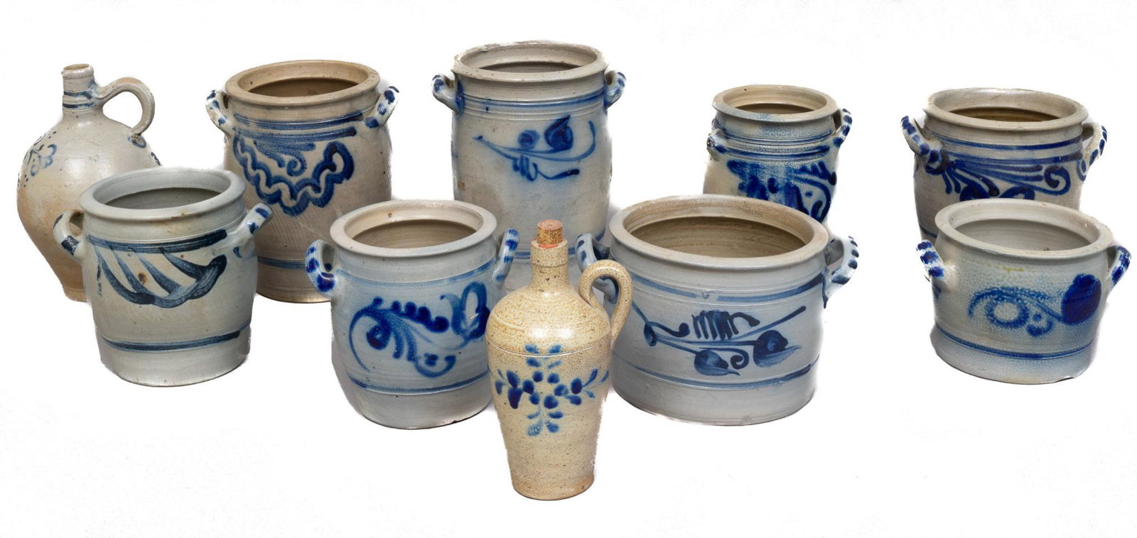 Collection of 10 Salt Glazed Pottery Crocks: Collection of ten salt glazed pottery crocks, with blue accents, to include jars 8.5"h x 8"d/ largest Provenance: A San Antonio, Texas collection We happily provide seamless shipping services on every