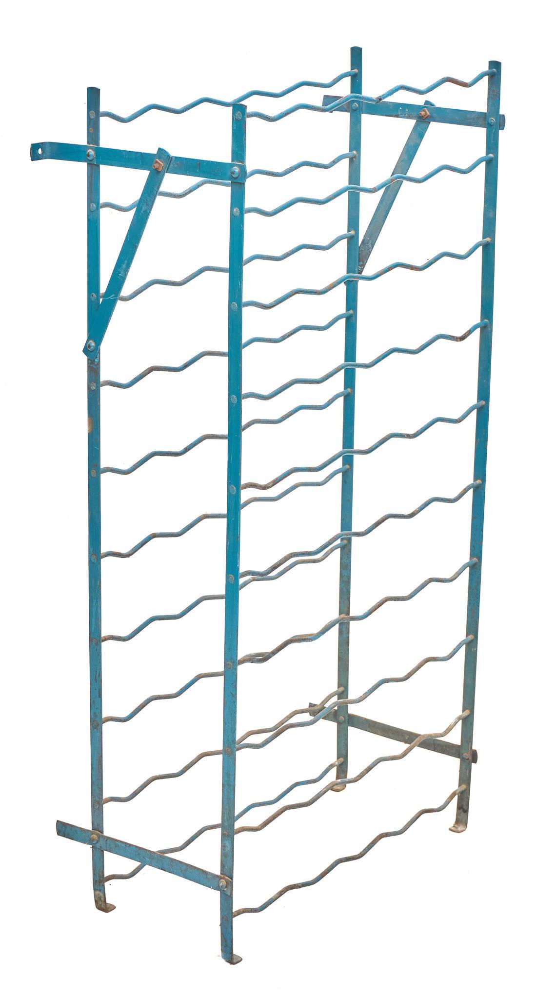 Wine Bottle Rack: Blue painted freestanding metal wine bottle rack 40"h x 20"w x 9"d We happily provide seamless shipping services on everything we sell. Please email us at shipping@vogtauction.com or c