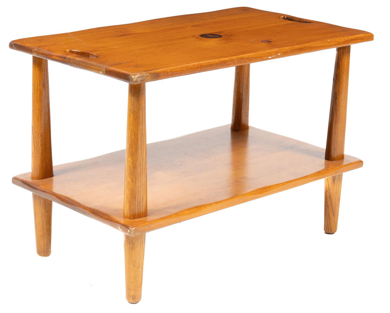 W.R. Dallas (San Antonio, TX), Serving Table: W.R. Dallas (San Antonio, Texas) two-tiered serving table, featuring top with perforated handles, rising on spoke legs 25.5"h x 36.5"w x 21.5"d Provenance: A Rockport, Texas collection We happily p