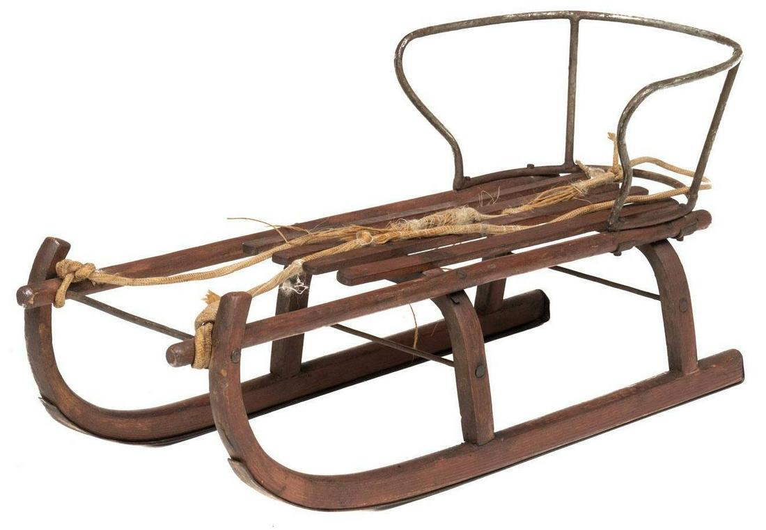 Rustic Wooden Sled: Children's sled, having wooden frame and metal back support, attached rope to front 15.5"h x 34"w x 14"d We happily provide seamless shipping services on everything we sell. Please email us at shipp