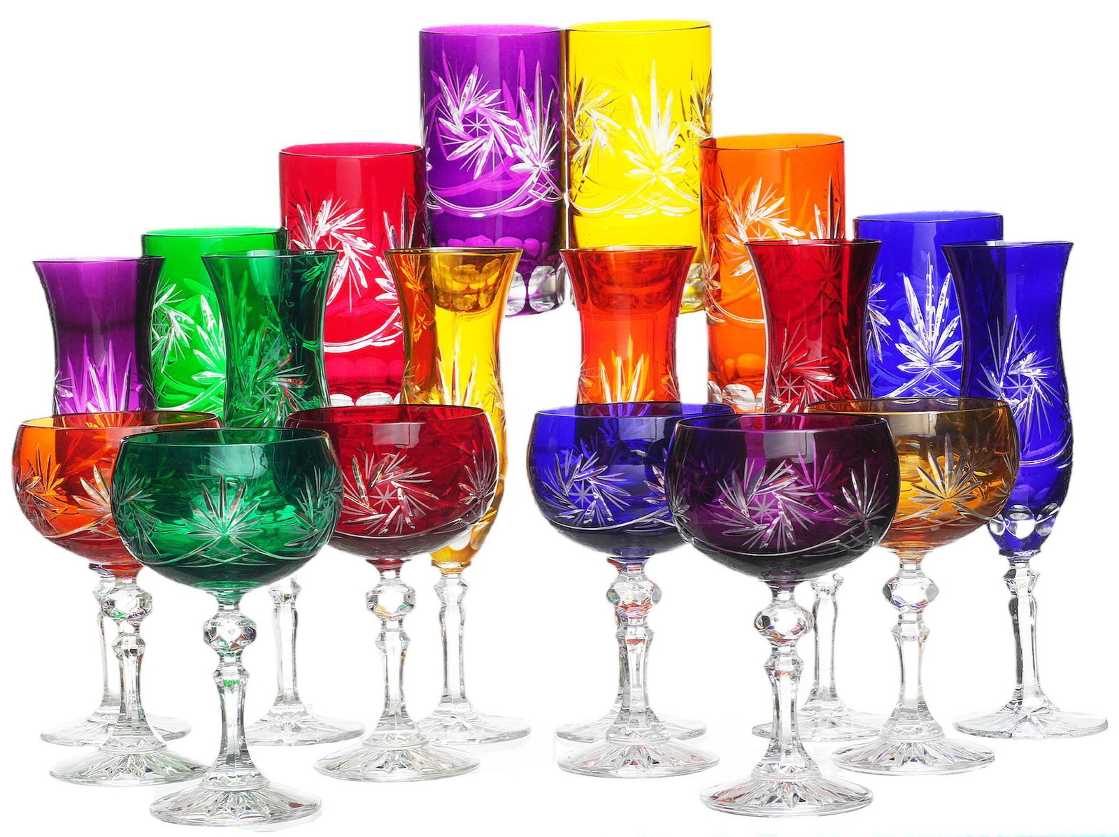 Collection of (18) Clear to Cut Glassware: Collection of eighteen pieces of colorful clear to cut glassware, to include wine cups, water glasses, and sherry cups 8"h x 3.5"d/ largest We happily provide seamless shipping services on eve