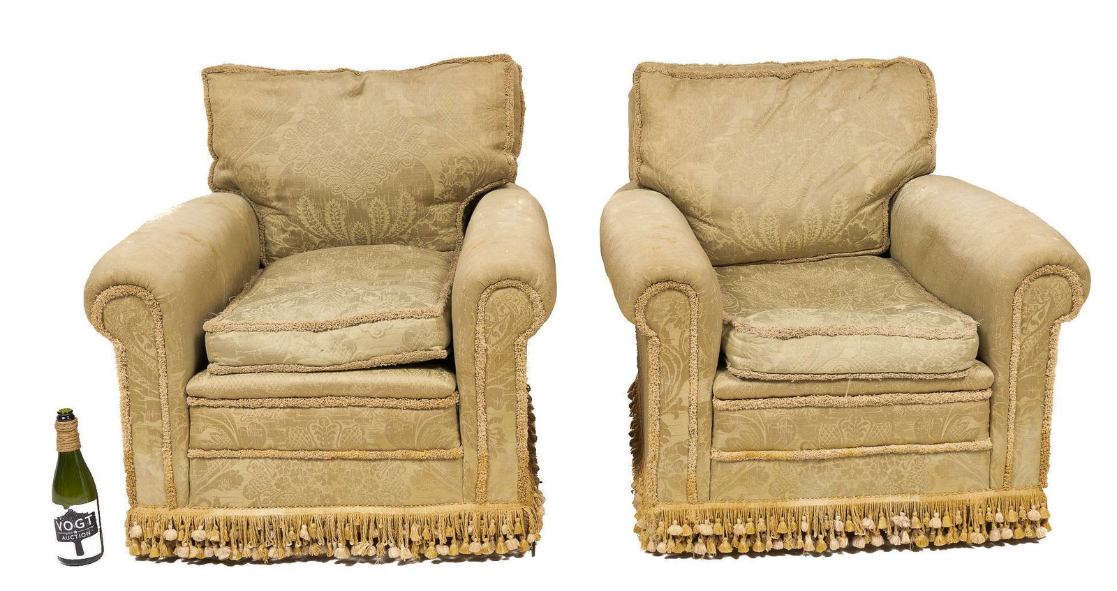 Pair of Matching Upholstered Armchairs: Pair of matching upholstered arm chairs, featuring tassel fringe and floral motif 31"h x 33"w x 37"d/ each Provenance: A San Antonio, Texas Collection We happily provide seamless shipping 