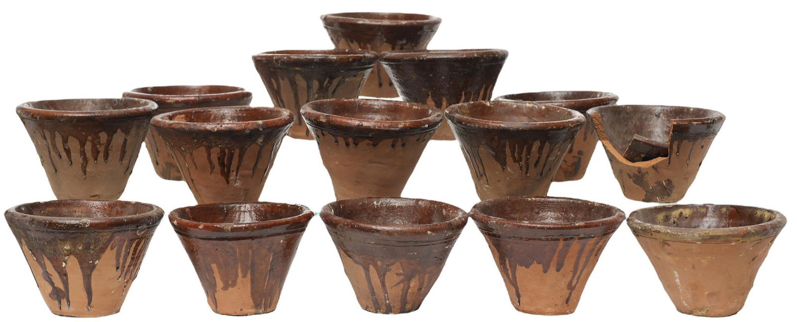 Collection of (15) Earthenware Flowerpots: Collection of fifteen earthenware flowerpots, featuring a drip glaze design 5"h x 7"d/ largest We happily provide seamless shipping services on everything we sell. Please email us at shipping&