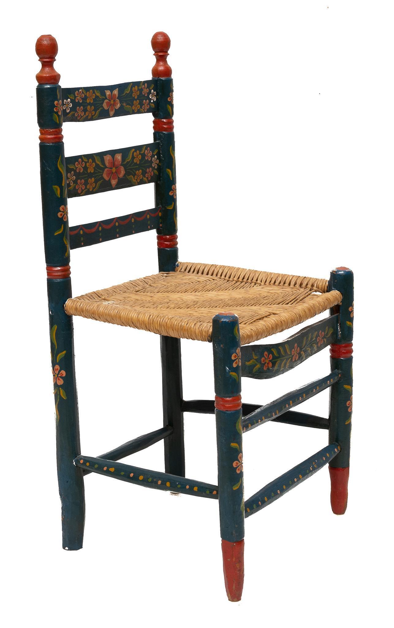 Mexican Folk Art Rush Seat Chair: Mexican folk art chair, featuring hand painted floral wooden frame with rush seat 36"h x 18"w Provenance: A San Antonio, Texas collection We happily provide seamless shipping services on everything we
