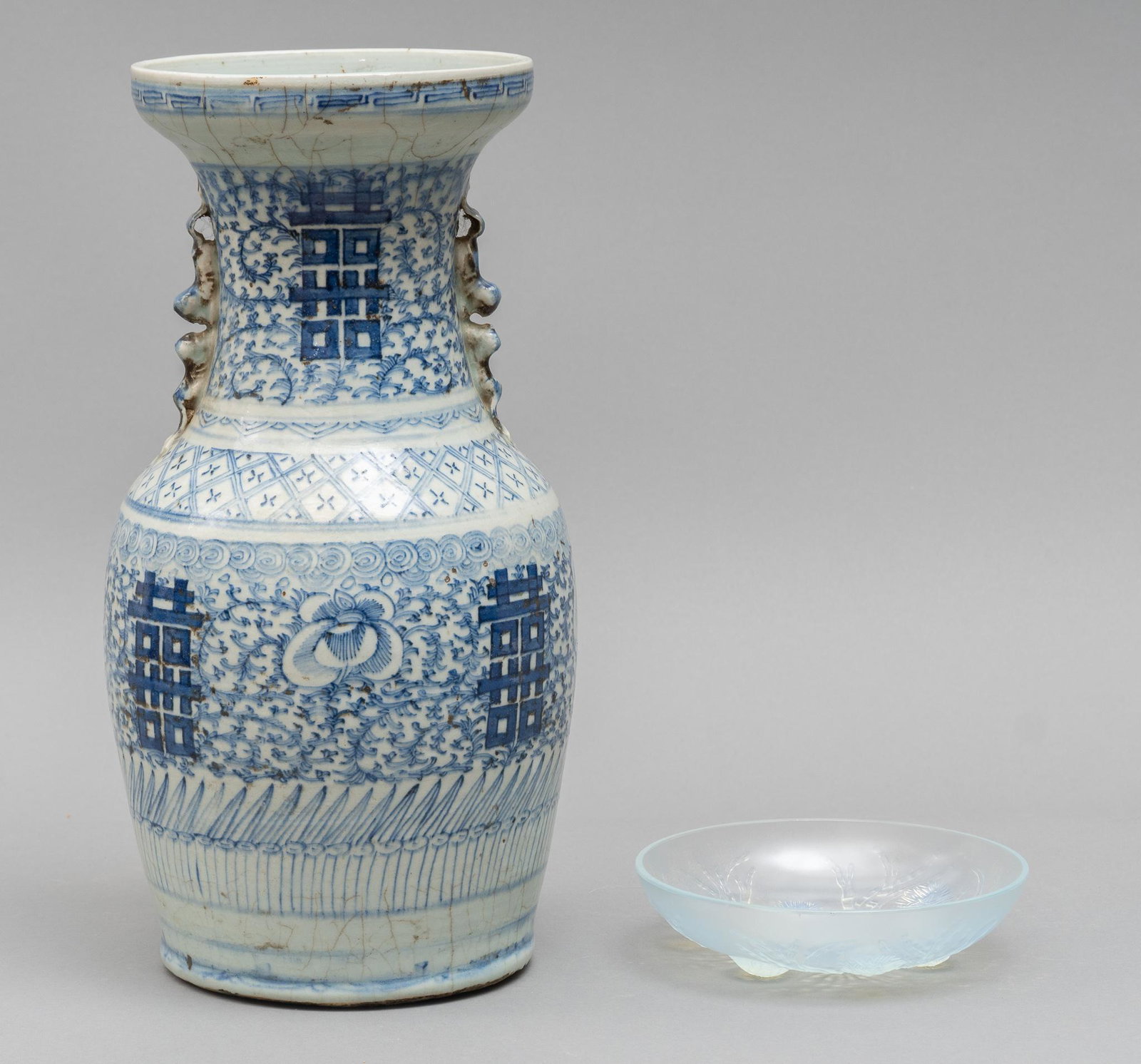 Pair of Vintage Decorative Vessels: Pair of vintage decorative vessels, to include a Chinese blue and white porcelain vase featuring foo dog handles, unmarked, Sabino opalescent glass dish, featuring seaweed and sea urchin design, signe