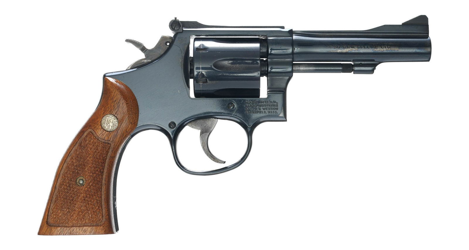 Smith & Wesson Model 15-4 .38SPL Revolver: Serial: ADU9193 Manufacturer: Smith & Wesson Model: 15-4 Caliber: .38SPL. Barrel length: 4" Condition: Very Good; wood grips have light handling marks; barrel & frame have light handling m