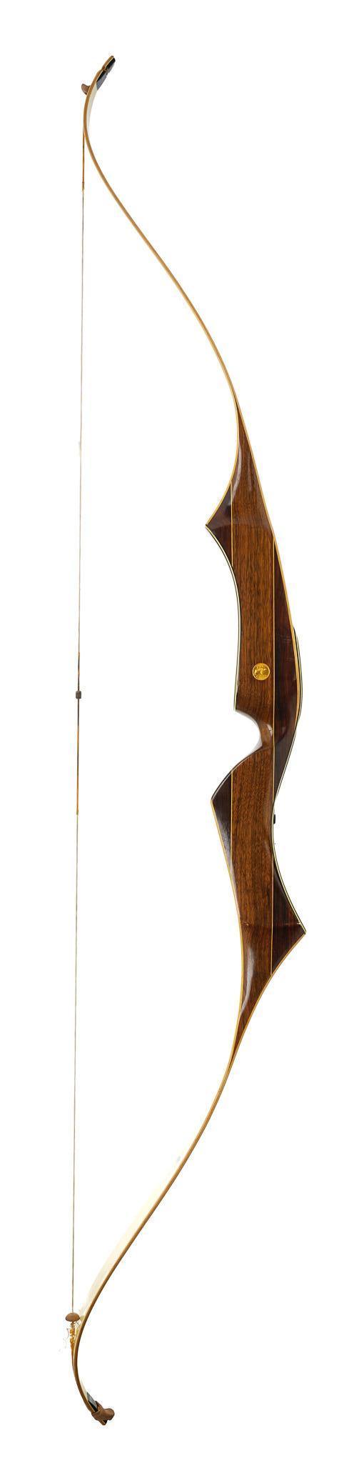 Vintage Bear Archery Temujin Recurve Bow: SN: 9G777 -AMO-69" -36# -Canada / 1953 Includes: Bear medallion embedded in right side of wood; bow string Condition: Good; some minor wear/ handling marks on wood bow; string appears to be in goo