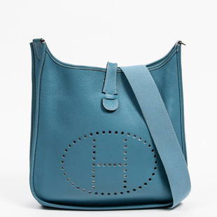 Hermes Evelyne 2 GM Leather Shoulder Bag: Hermes Evelyne 2 GM shoulder bag of blue toga calf leather with blue canvas handle and silvertone hardware; marked Stamp I in square (2005).  Condition AA Near perfect condition, has barely been carri