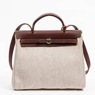 Hermes Herbag PM Canvas Toile Shoulder Bag: Hermes Herbag PM shoulder bag of cream toile H canvas with brown leather accents, handles and goldtone hardware; includes interchangeable bag, cadenas, keys on clochette and dustbag; marked stamp E