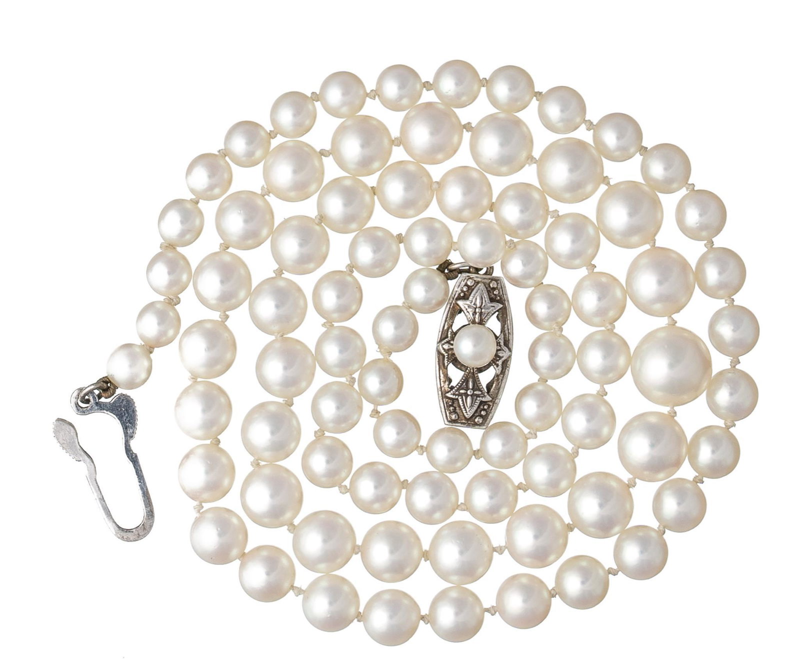 Vintage Mikimoto Graduated Pearl Necklace: Pearls graduated from 4.5-5mm to 7.5-8mm with signature sterling silver clasp Length 20;; total weight 20.4 grams Provenance: A San Antonio, Texas collection We happily provide seamless shipping servi