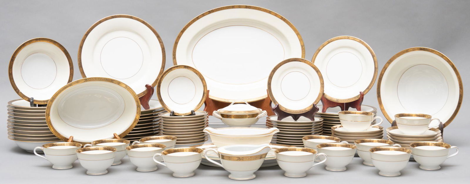 Noritake Japanese Porcelain, Service for 12: Noritake Japanese porcelain set, to include teacups, saucers, plates, bowls etc., featuring matching gold accents, service for twelve 16"h x 10"d / tallest Provenance: A San Antonio, Texas