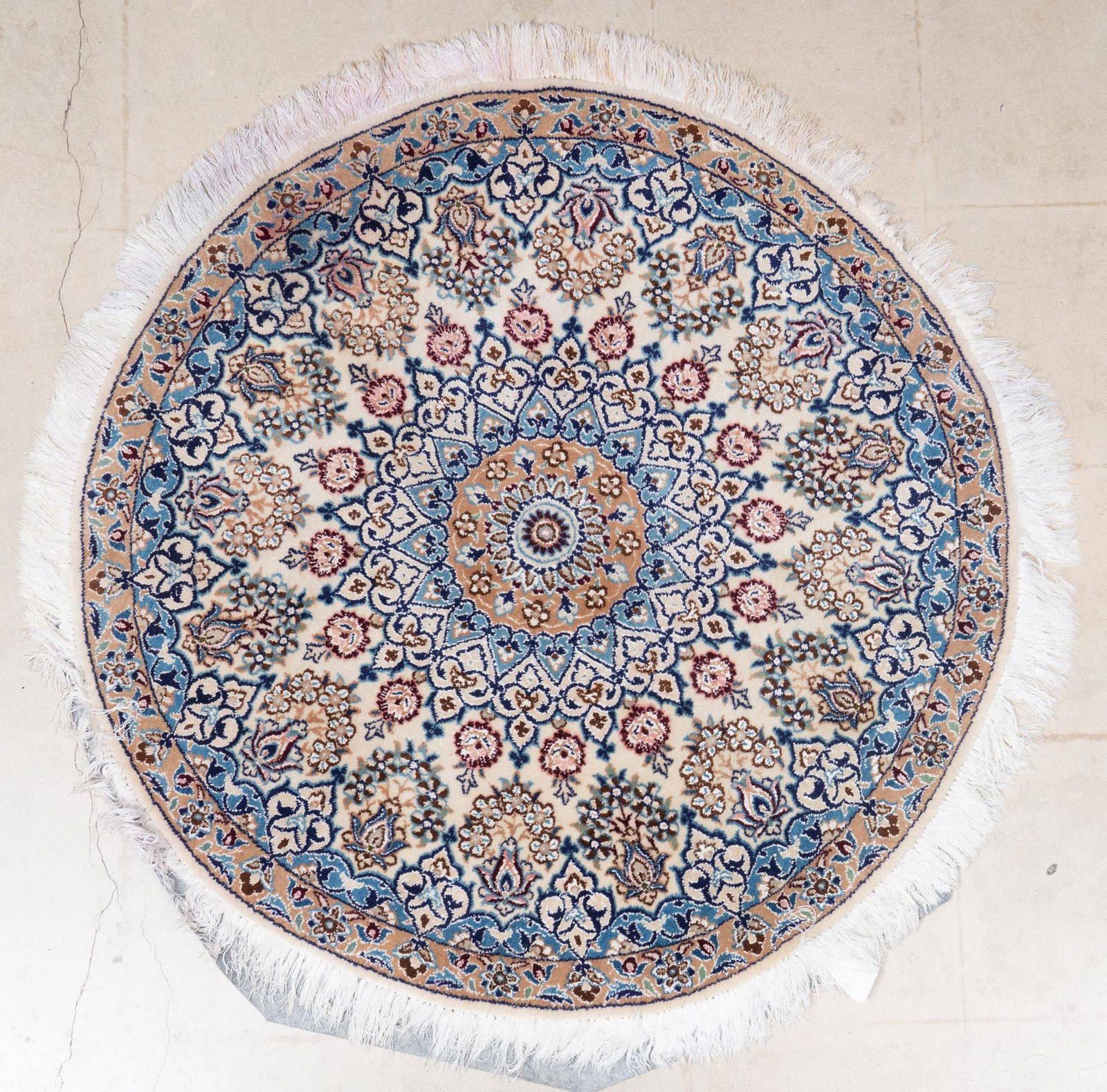 Hand-Made Nain Style Rug, 4': Round Hand-made Nain style rug 4'd Provenance: A San Antonio, Texas collection We happily provide seamless shipping services on everything we sell. Please email us at shipping@vogtauction.c