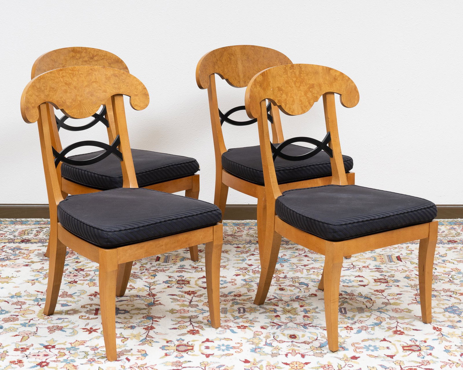Set of (4) Matching Biedermeier Chairs: Set of four Biedermeier chairs, having black seat cushions, featuring veneer shovel backs with black twist splat 37"h x 20 1/2"w x 22"d We happily provide seamless shipping services on eve