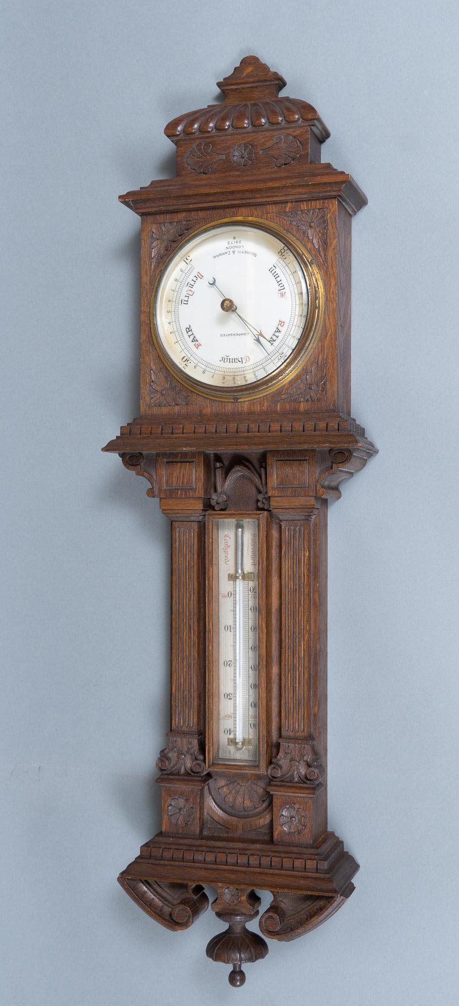 Antique Negretti and Zambra Barometer and Thermometer: Antique Negretti and Zambra barometer, having thermometer with original mercury, flanked by carved pilasters, above carved floral motif 29"h x 8 1/2"w x 3"d Provenance: A prominent Terrell Hills, Texa