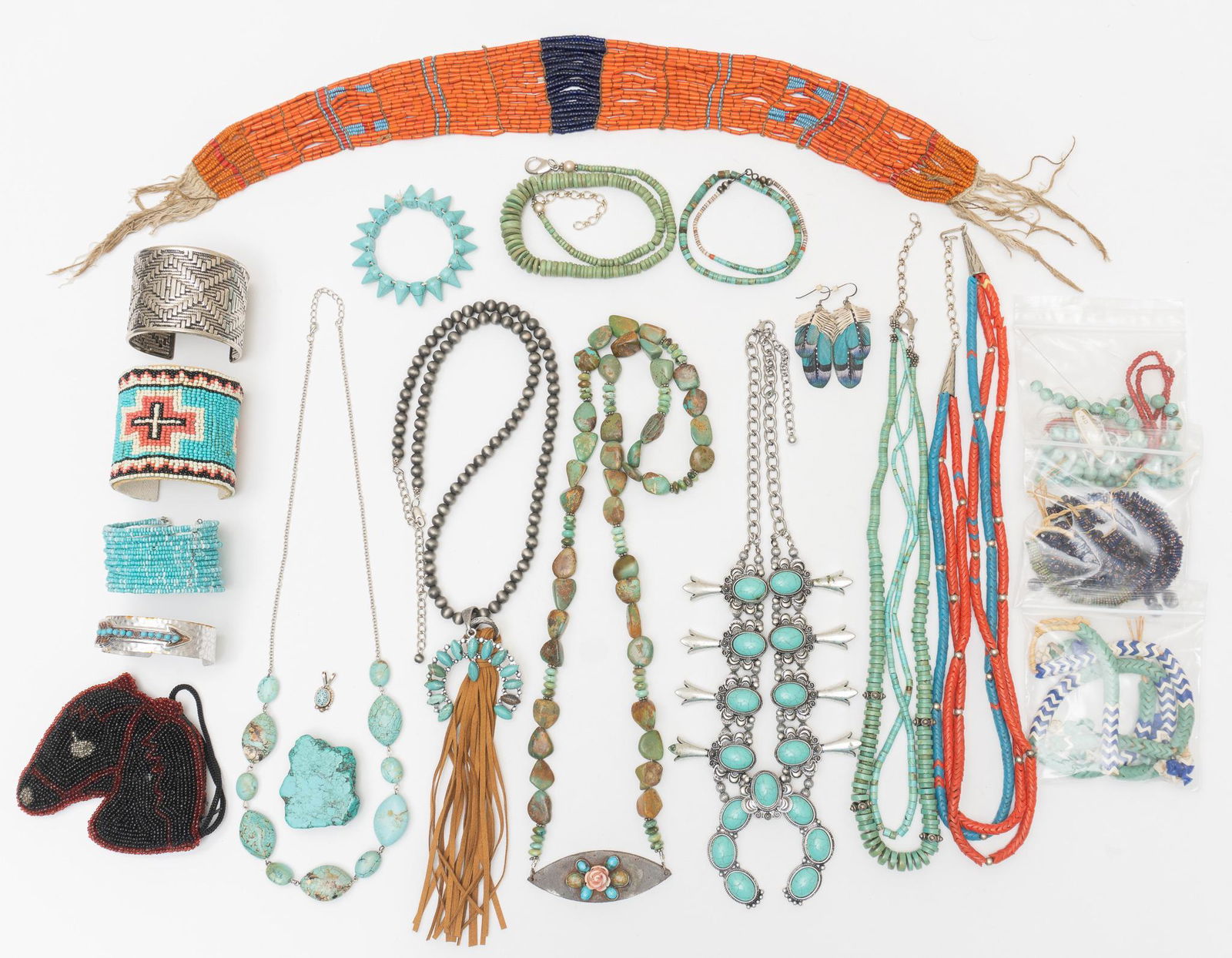 Collection of Vintage Southwestern Jewelry: Collection includes mostly necklaces some of turquoise, beadwork bracelet, collar necklace, faux squash blossom necklace and cuff bracelets. Necklace lengths 18-38" â€¹Provenance: estate of Phy