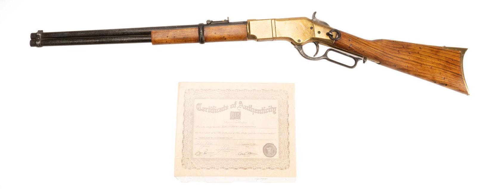 Lou Diamond Phillips Young Guns Movie Prop Rifle: Non-functioning movie prop, used in the movie Young Guns (1988) by actor Lou Diamond Phillips, with COA: No FFL Required Provenance: A Spring Branch, Texas collection 12"h x 38.5"w x 1"d We happily