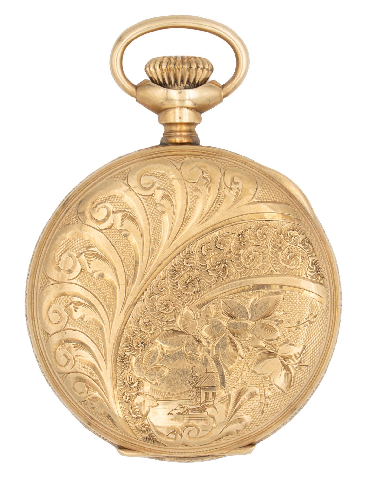 Antique 14k Gold Waltham Pocket Watch: Antique 14k yellow gold pocket watch by American Waltham with engraved case, white face and black markers; running condition. Case diameter 39mm; total weight 34.4 grams Provenance: The Estate of Wi