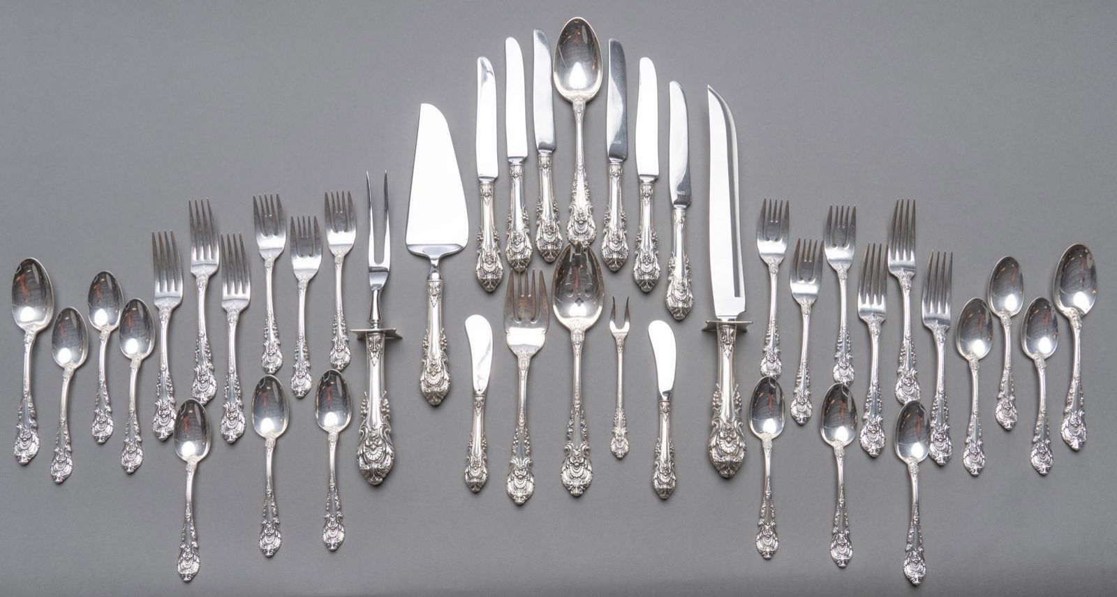 "Sir Christopher" Wallace Silversmiths Sterling Flatware Set 42pc: "Sir Christopher" by Wallace Silversmiths sterling silver flatware set 42pc; no monogram or removal Includes: 6 dinner knives 9" 6 dinner forks 7 1/4" 2 hollow handle butter knives 6 salad forks 12 t