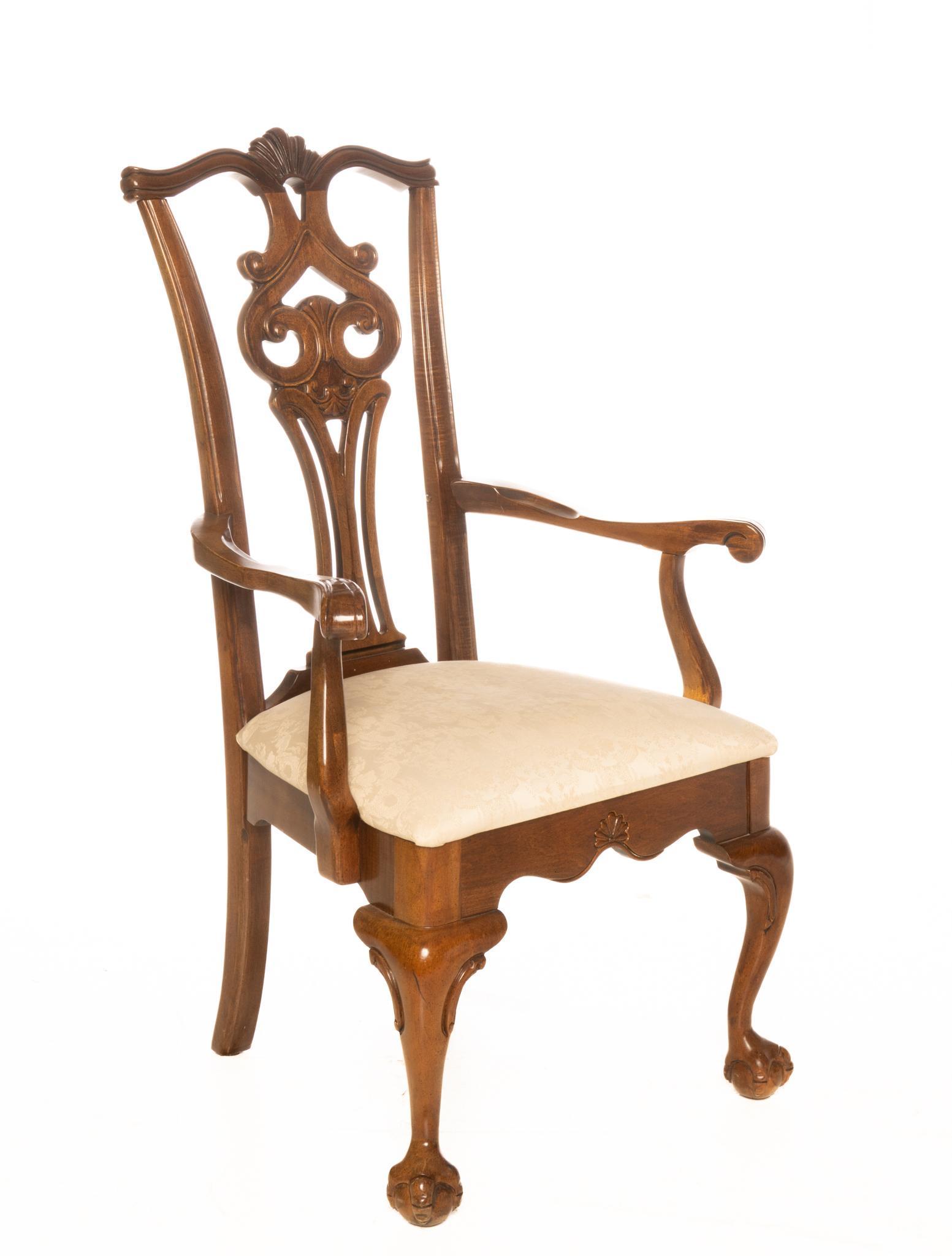 Chippendale Style Dining Chair: Chippendale style dining chair, having damask upholstered seat, featuring scroll and floral motif, rising on cabriole legs ending in claw and ball feet 34.5"h x 26"w x 27"d Provenance: Property from a