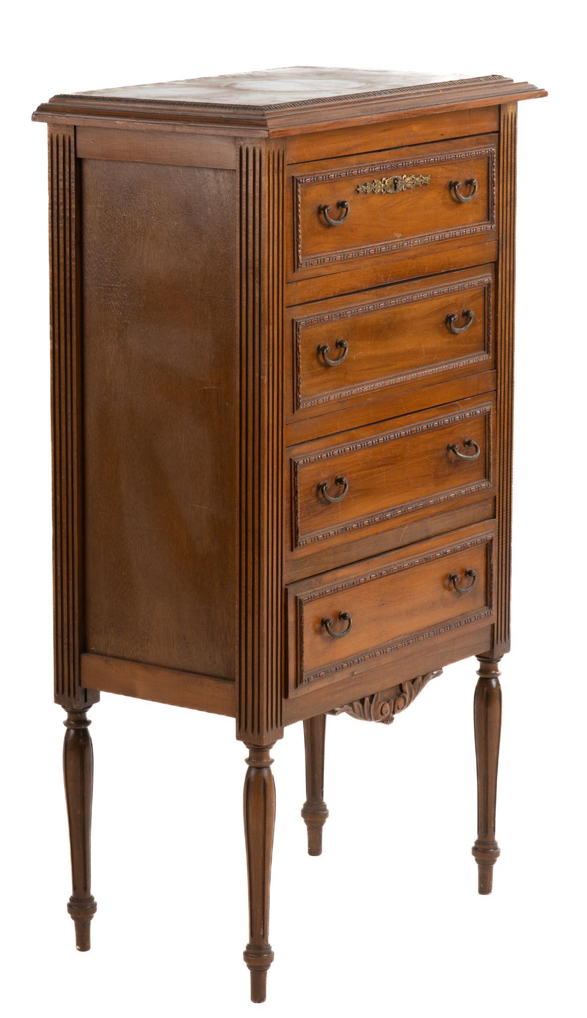Louis XVI Style Commode: Louis XVI style oak commode, having marble inlay top, above four stacked drawers, featuring carved accents and scroll motif, rising on fluted legs 40"h x 22"w x 13"d We happily provide seamless ship