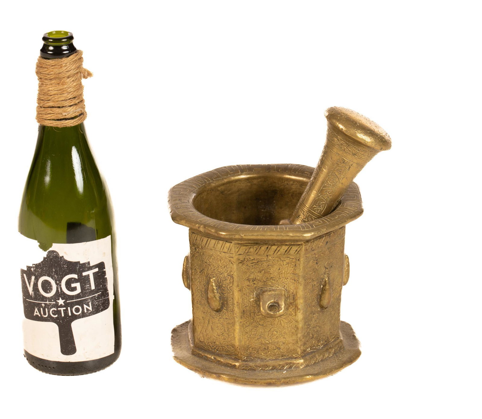 Asian Mortar and Pestle Pair: Brassware mortar and pestle pair, featuring etched accents 8"h x 7"d Provenance: A New Braunfels, Texas collection We happily provide seamless shipping services on everything we sell. Please email us 