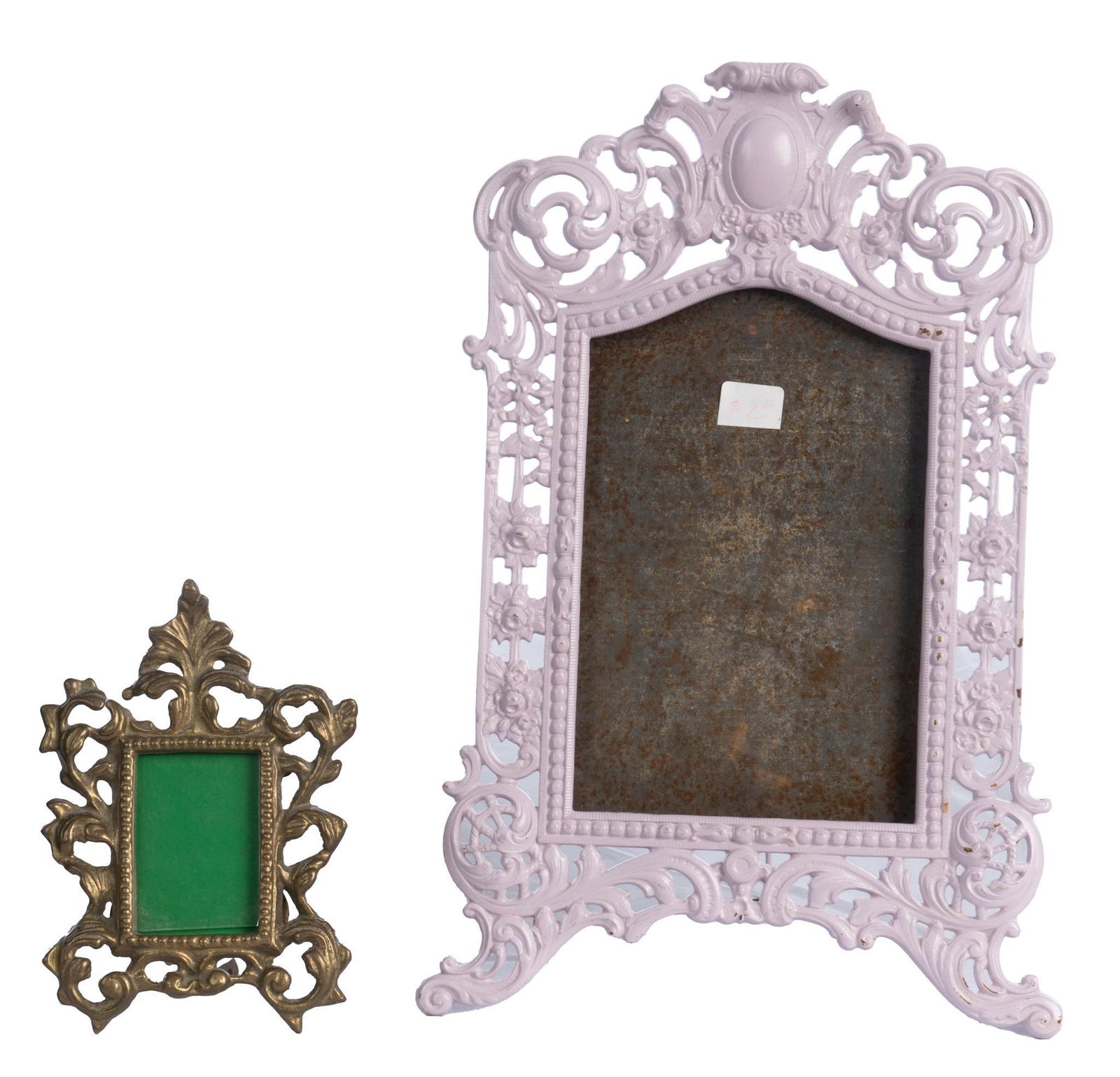 Pair of Vintage Table Mirrors: Pair of vintage table mirrors, having painted metal and brass frames, featuring scroll motif 15"h x 10"w x 8"d / largest Provenance: Property from a Tapatio Springs, Texas estate We happily provide