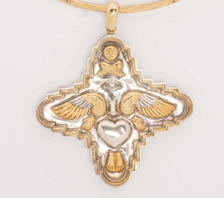 Sergio Bustamante Sterling Silver Sacred Heart Necklace: Sergio Bustamante Mexican sterling silver Sacred Heart with gold accents. collar not signed Bustamante Heart length 3" (including bale); collar 4 3/4 inside diameter; total weight 59.1 grams Prove