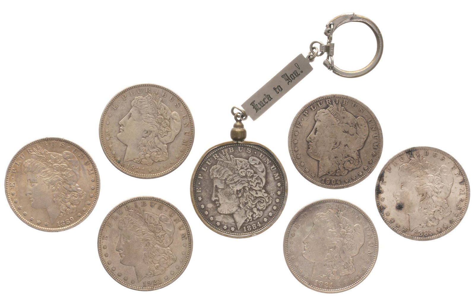 (7) Morgan Silver Dollars: Includes: 7 Morgan silver dollars Provenance: The Estate of Phyllis Vincent, Dallas, Texas We happily provide seamless shipping services on everything we sell. Please email us at shipping@vogta