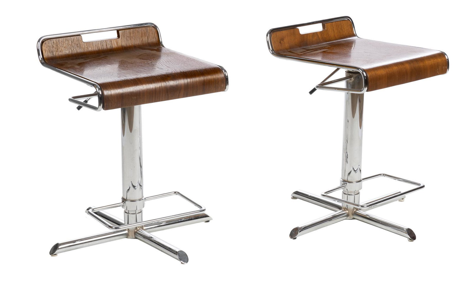 Pair of Danish Mid-Century Laminate Bar Stools: Pair of Danish Mid-Century bar stools, featuring laminated seats, with handled backs, waterfall edge, supported on chrome base, with rectangular foot rest 24"h x 21"w x 21"d We happily provide seamles