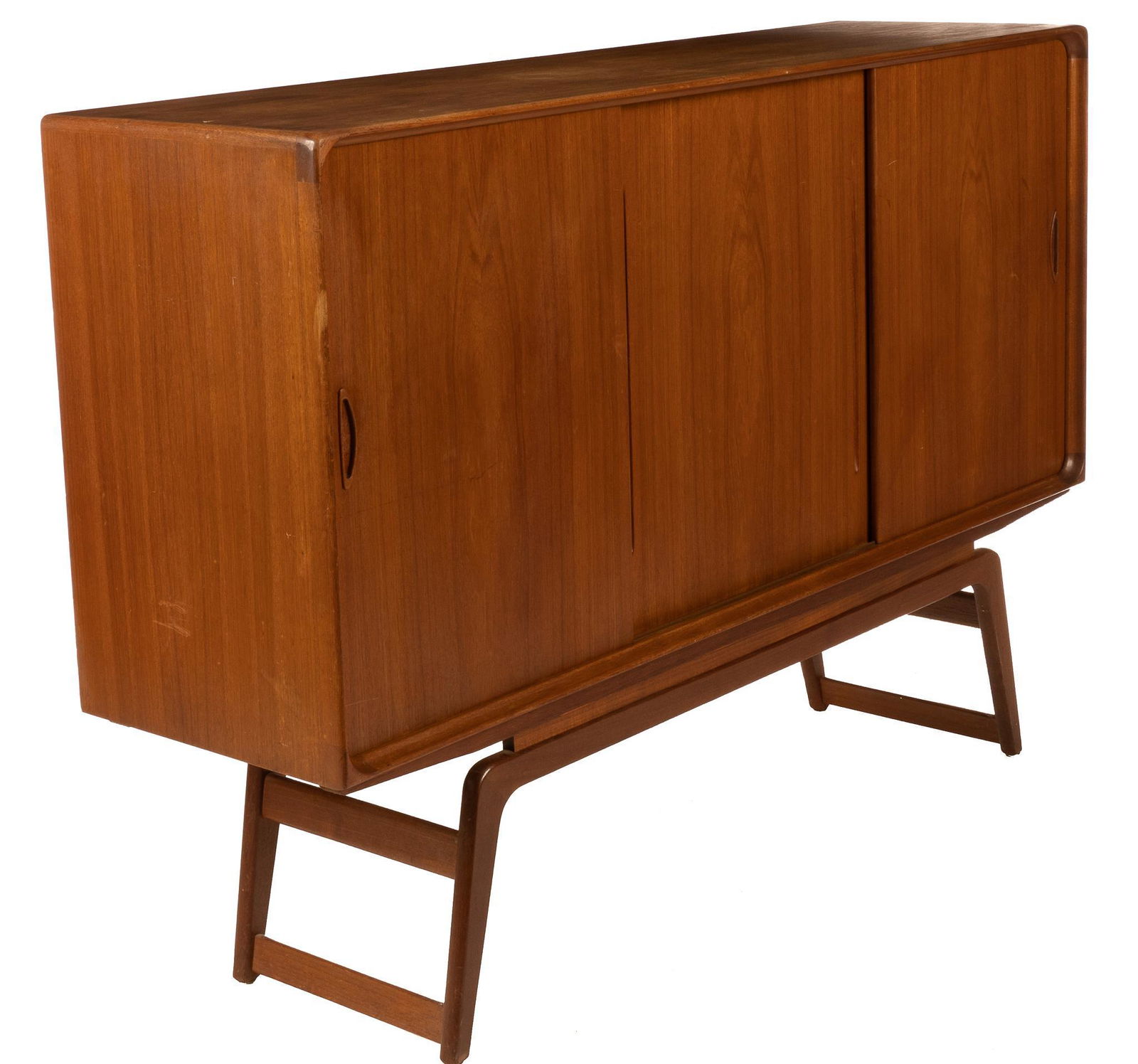 Clausen & Son Mid-Century Sideboard: Clausen & Son Danish Mid-Century sideboard, having sliding doors, opening to interior, leading to interior shelves, supported on stretchered legs 46"h x 67"w x 18.5"d We happily provide seamless shi