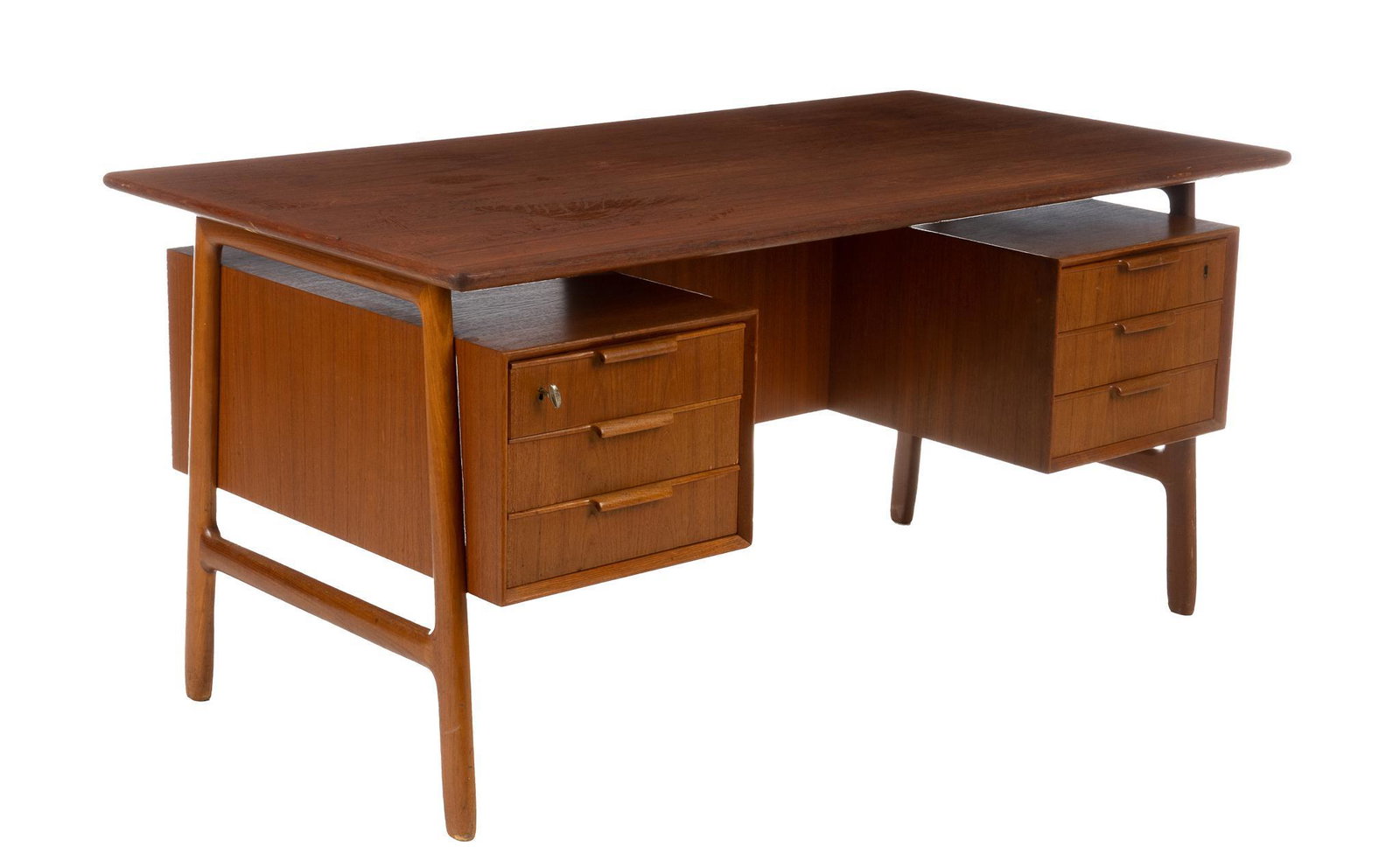 Mid-Century Oman Jun Model 75 Desk: Mid-Century Oman Jun model 75 teak desk, featuring floating top, above dual stack of drawers, with open storage shelves on reverse, supported on stretchered spoke feet, marked 28.5"h x 60.5"w x 31.5"d