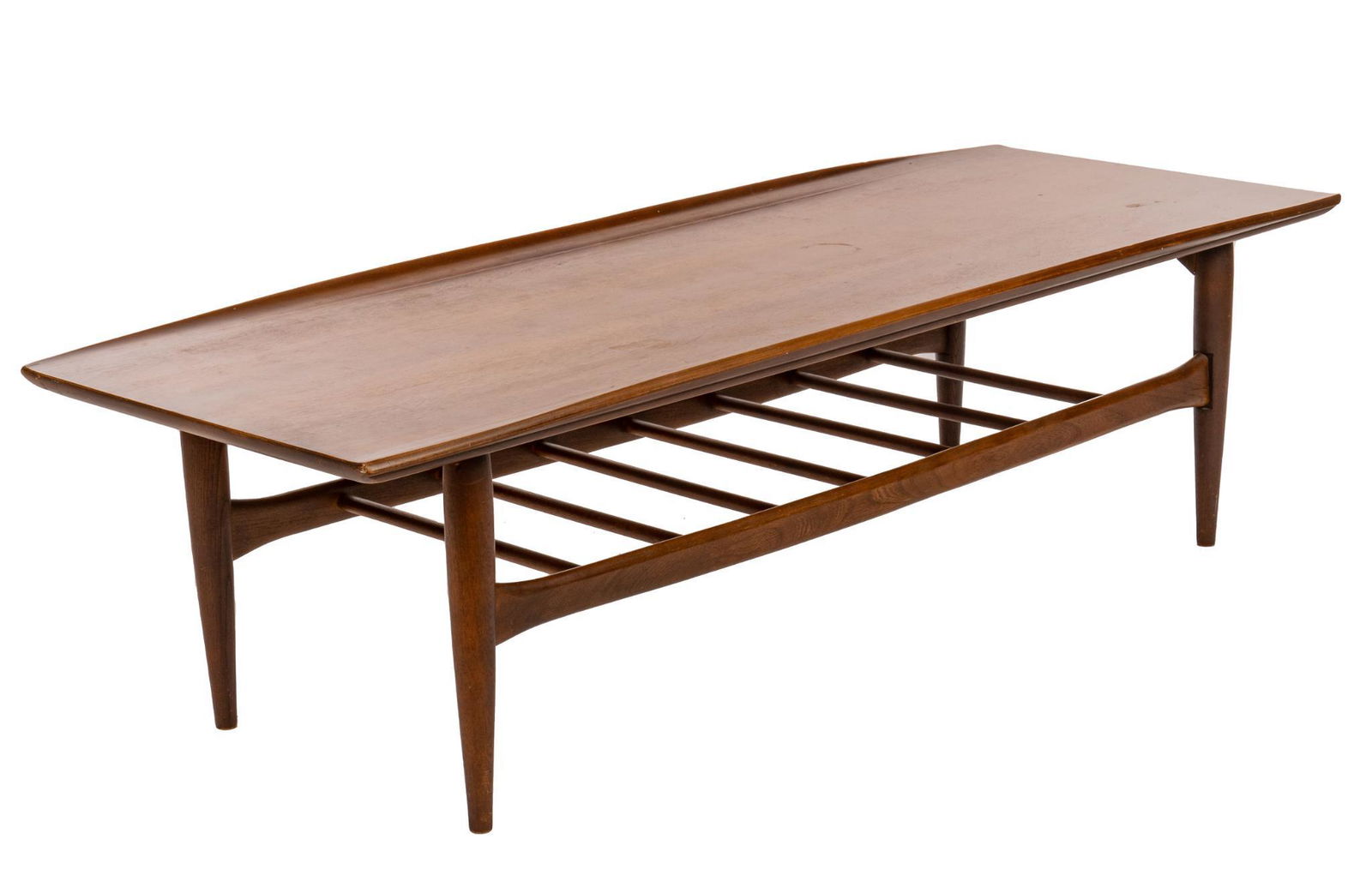 Mid-Century Grete Jalk Style Surfboard Coffee Table: Mid-Century Grete Jalk style coffee table, manufactured by Basset, from the Artisan collection, having over-sized surfboard top, with raised gallery, above rack, marked, supported on tapered legs 15.