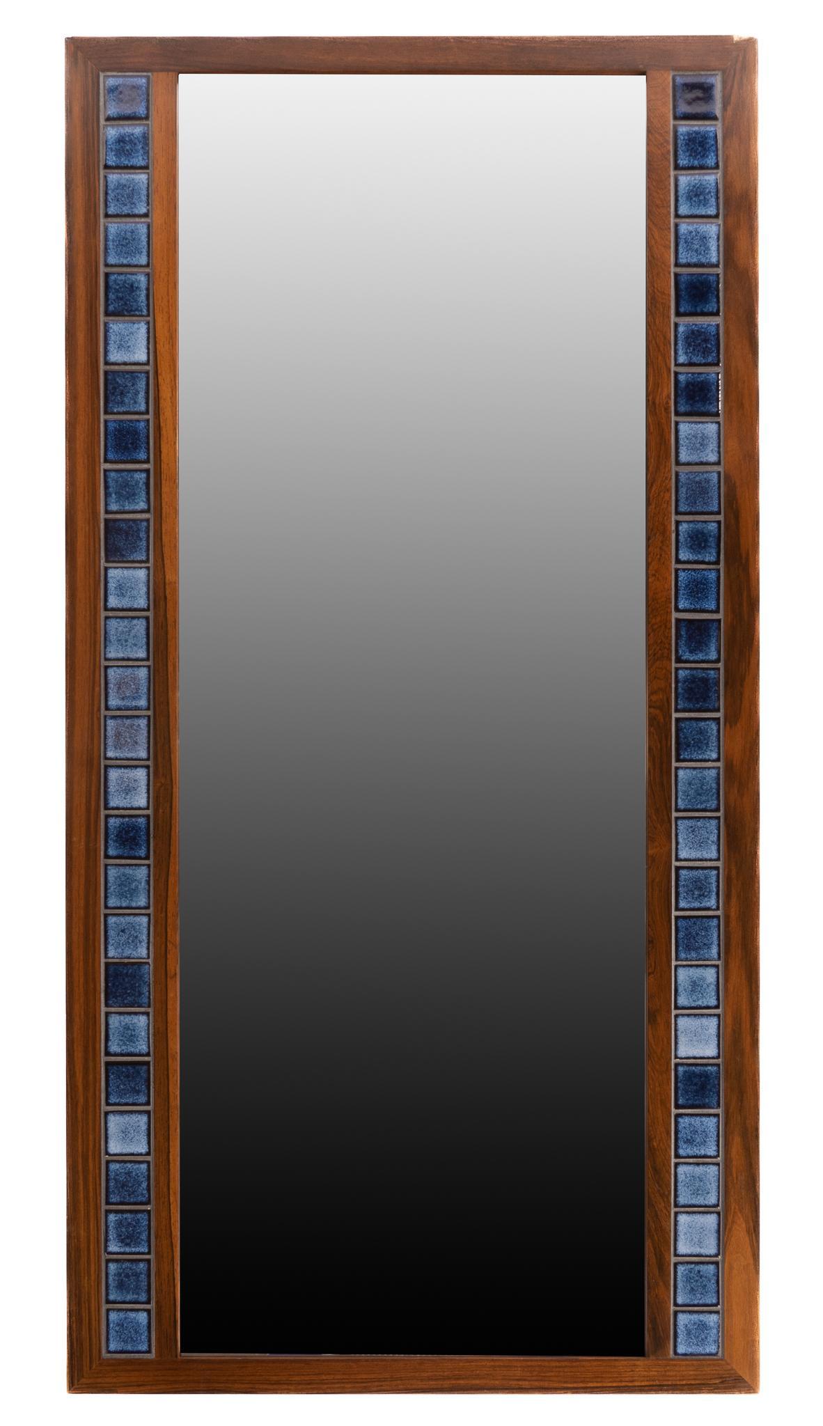 Danish Mid-Century Tile Framed Mirror: Danish Mid-Century tile framed mirror, featuring blue tile border, rectangular mirror face 45.5"h x 23.5"w We happily provide seamless shipping services on everything we sell. Please email us at shipp