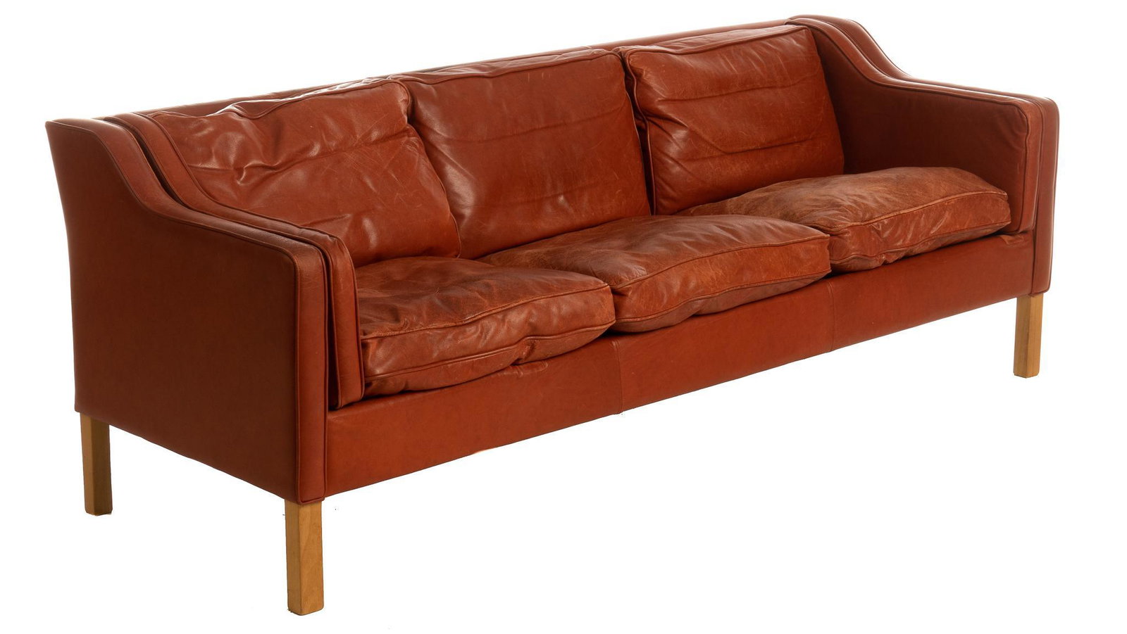Borge Mogensen Mid-Century Leather Sofa: Danish Mid-Century three-seater sofa, design by Borge Mogensen, featuring red leather upholstery, supported on block legs 29.5"h x 82.5"w x 30.5"d Note: Matching chair to be sold in auction We happily