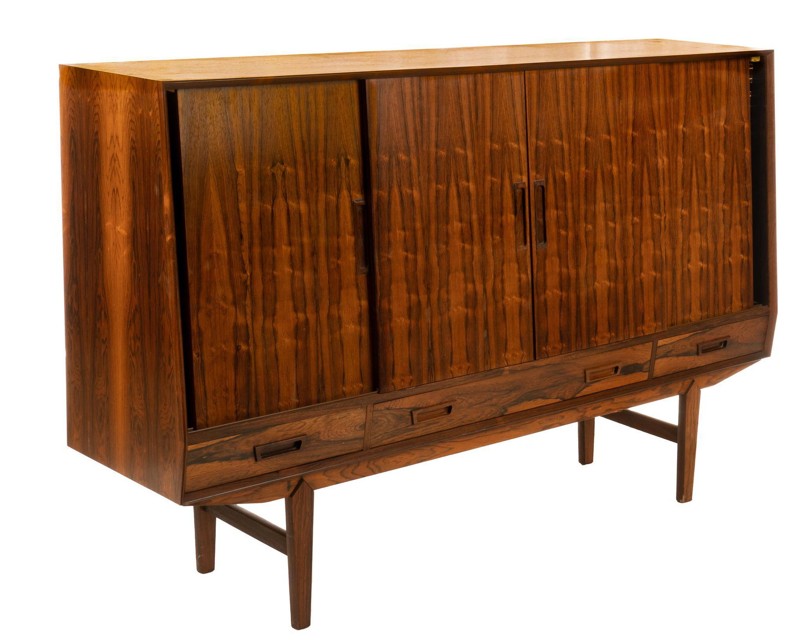 Danish Mid-Century Credenza: Danish Mid-Century credenza/sideboard, featuring sliding doors, opening to center shelves, flanked flat drawers with mirror backed interior, above drawers, rising on tapered pin legs 44"h x 70"w x 16"