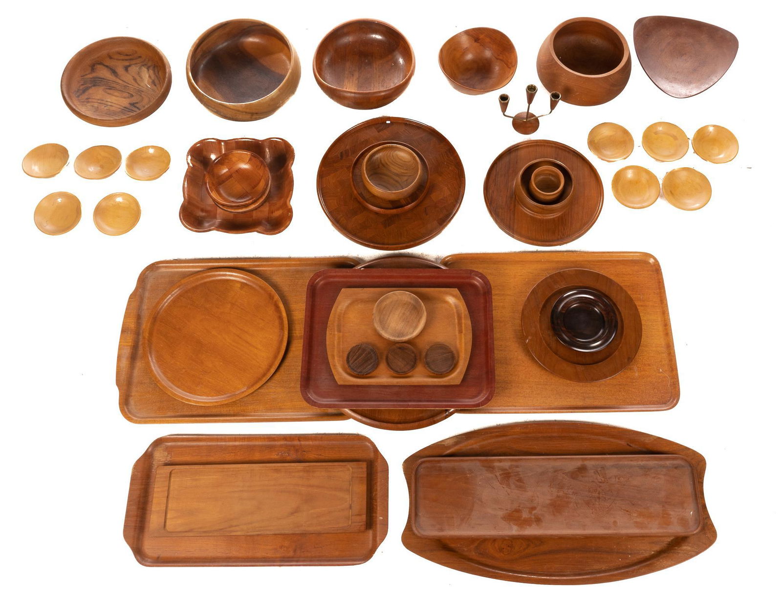 Collection of Hand-Carved Wooden Servingware: Collection of Mid-Century hand-carved wooden servingware, to include bowls, trays, plates, featuring table candelabra, marked 5.5"h x 10"w x 10"d We happily provide seamless shipping services on eve