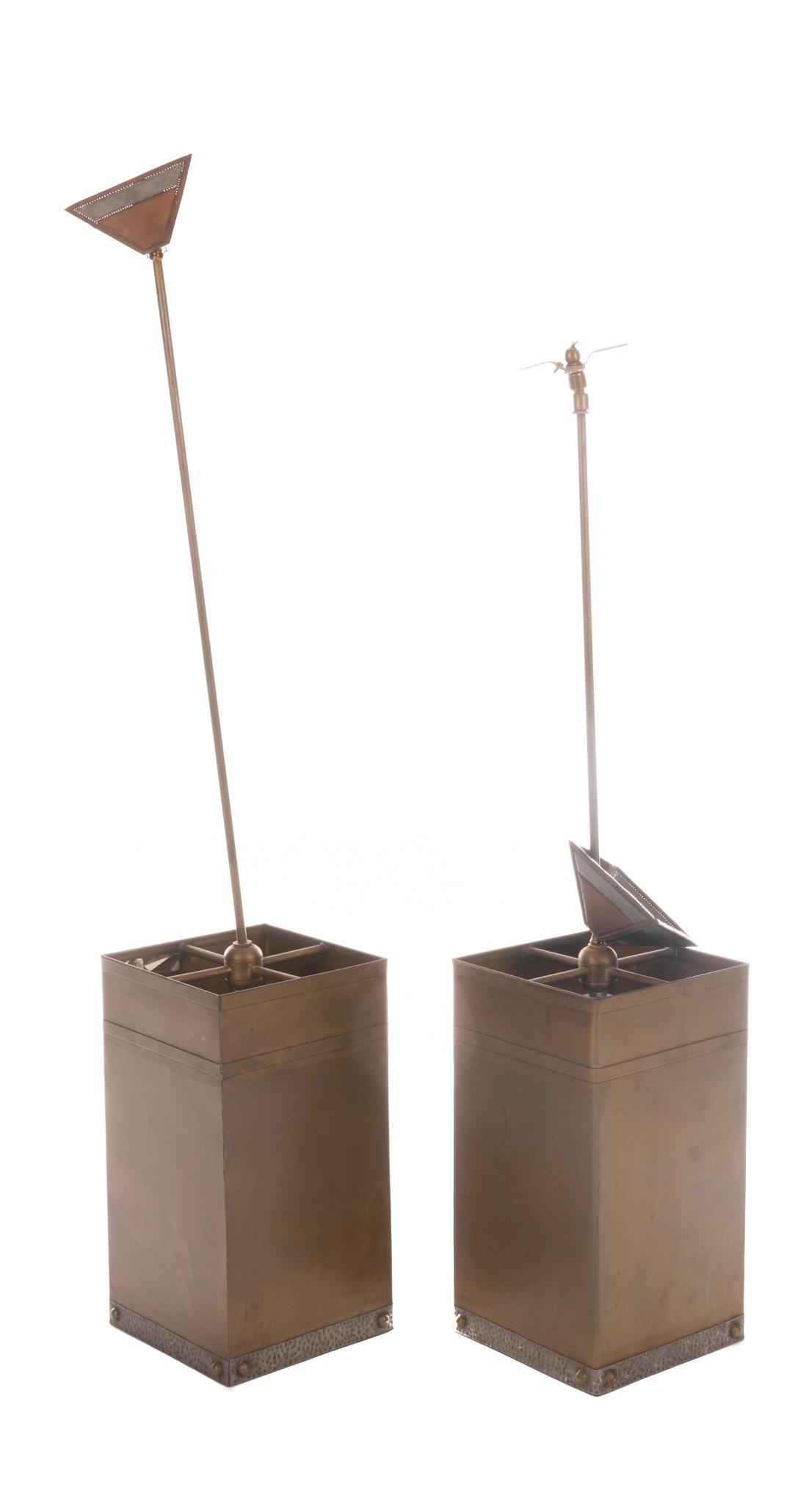 Isaac Maxwell (San Antonio, TX) Pair of Light Fixtures: Isaac Maxwell (San Antonio, TX), pair of matching hanging light pendants, having copper body, hammered metal trim, to include wiring The spectacle of intricately patterned silhouette lighting is a dis