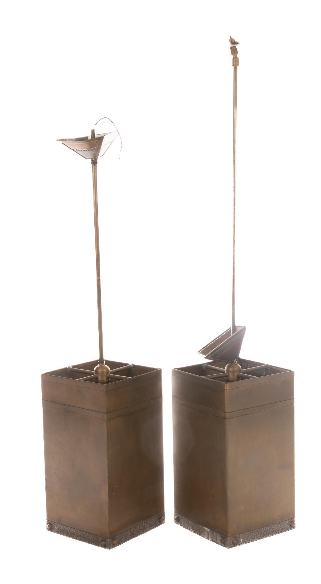 Isaac Maxwell (San Antonio, TX) Pair of Hanging Light Fixtures: Isaac Maxwell (San Antonio, TX), pair of matching hanging light pendants, having copper body, hammered metal trim, to include wiring The spectacle of intricately patterned silhouette lighting is a dis
