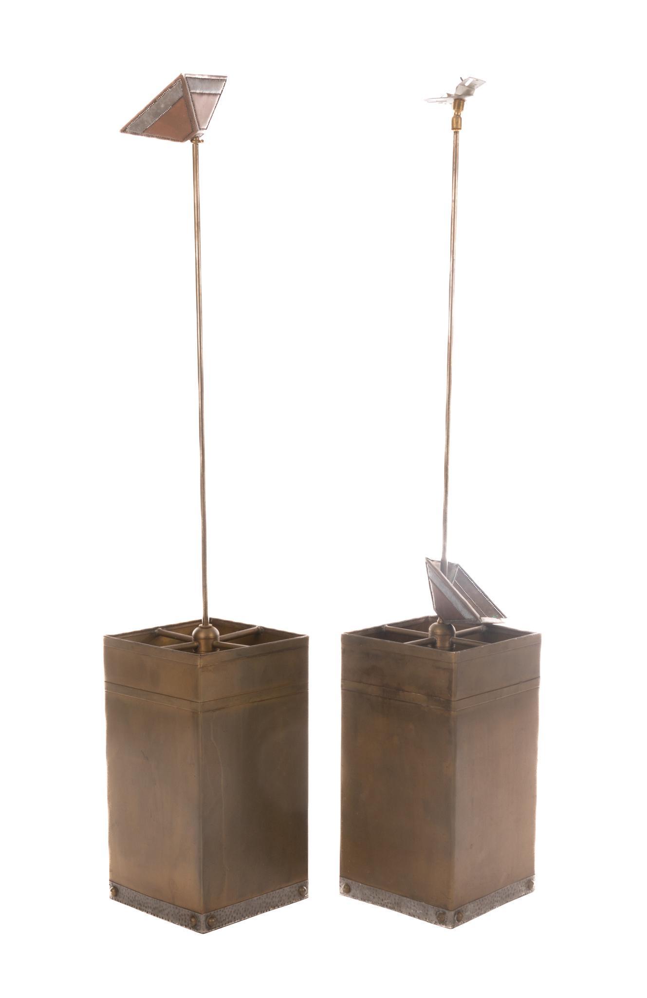 Isaac Maxwell (San Antonio, TX) Pair of Hanging Light Fixtures: Isaac Maxwell (San Antonio, TX), pair of matching hanging light pendants, having copper body, hammered metal trim, to include wiring The spectacle of intricately patterned silhouette lighting is a dis