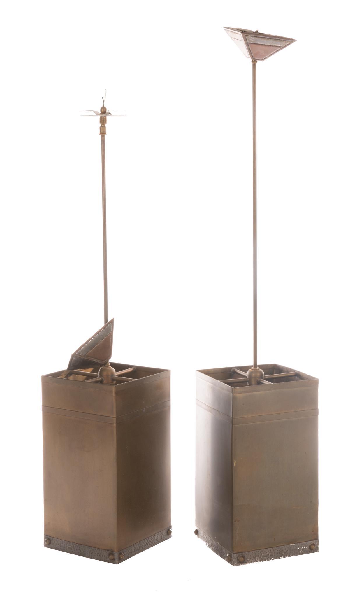 Isaac Maxwell (San Antonio, TX) Pair of Hanging Light Fixtures: Isaac Maxwell (San Antonio, TX), pair of matching hanging light pendants, having copper body, hammered metal trim, to include wiring The spectacle of intricately patterned silhouette lighting is a dis