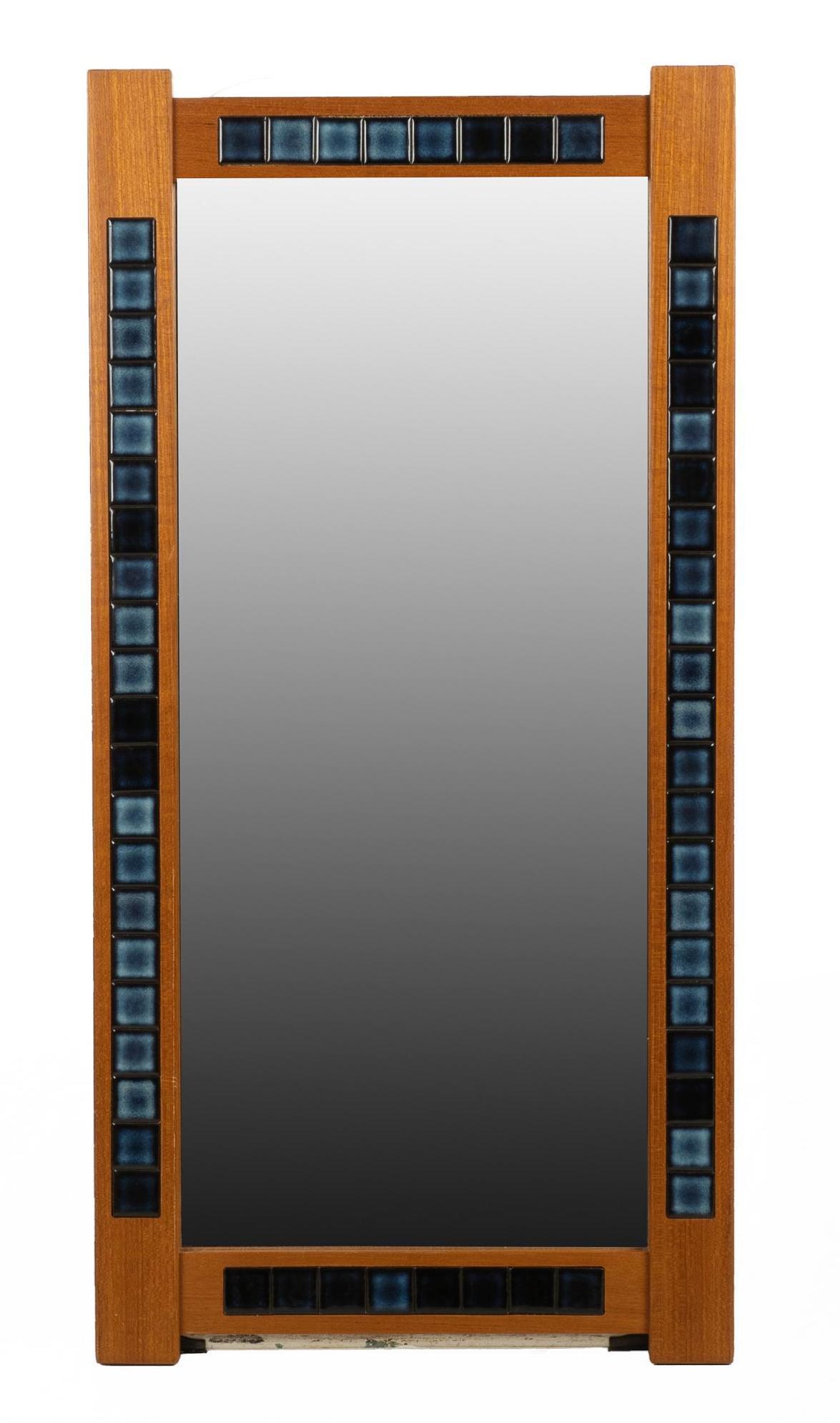 Danish Mid-Century Tile Frame Mirror: Danish Mid-Century blue tile framed wall hanging mirror 42"h x 21"w x 1"d We happily provide seamless shipping services on everything we sell. Please email us at shipping@vogtauction.com or call 210-9