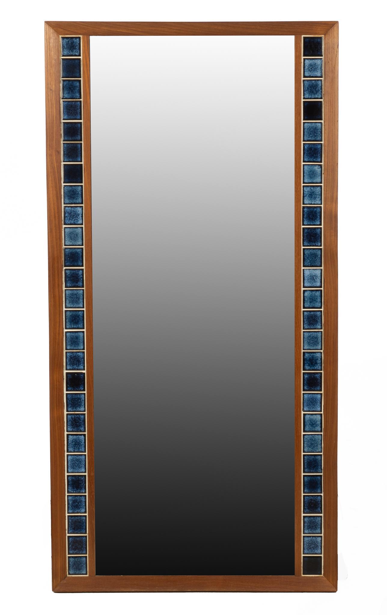 Danish Mid-Century Tile Frame Mirror: Danish Mid-Century blue tile frame wall hanging mirror 46"h x 23"w We happily provide seamless shipping services on everything we sell. Please email us at shipping@vogtauction.com or call 210-971-5750